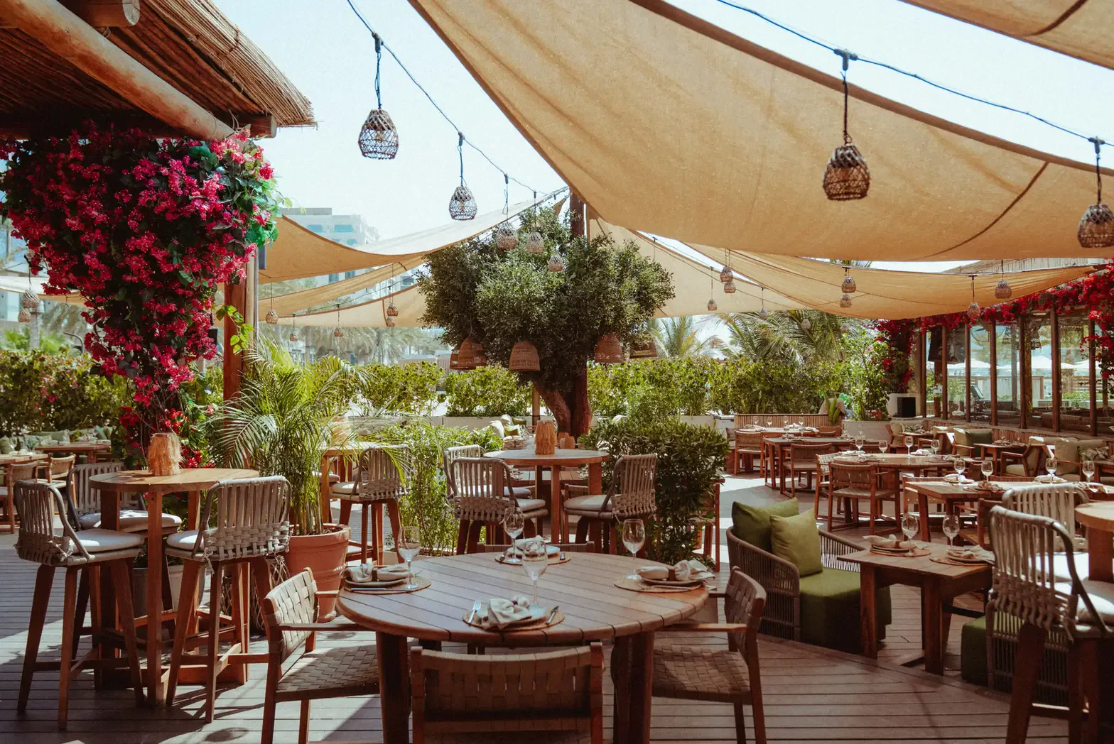 Surf Club Dubai shaded Mediterranean beachfront restaurant on Palm West Beach